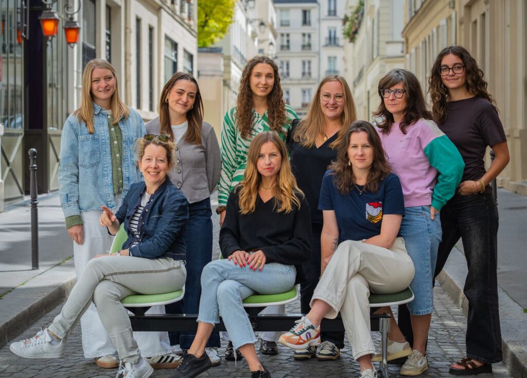 The Trapèze team together on a cobbled Paris street