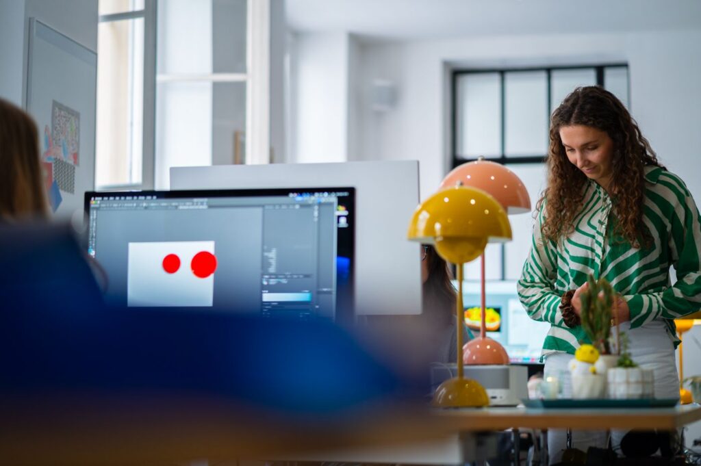 A designer at work in the agency's bright studio