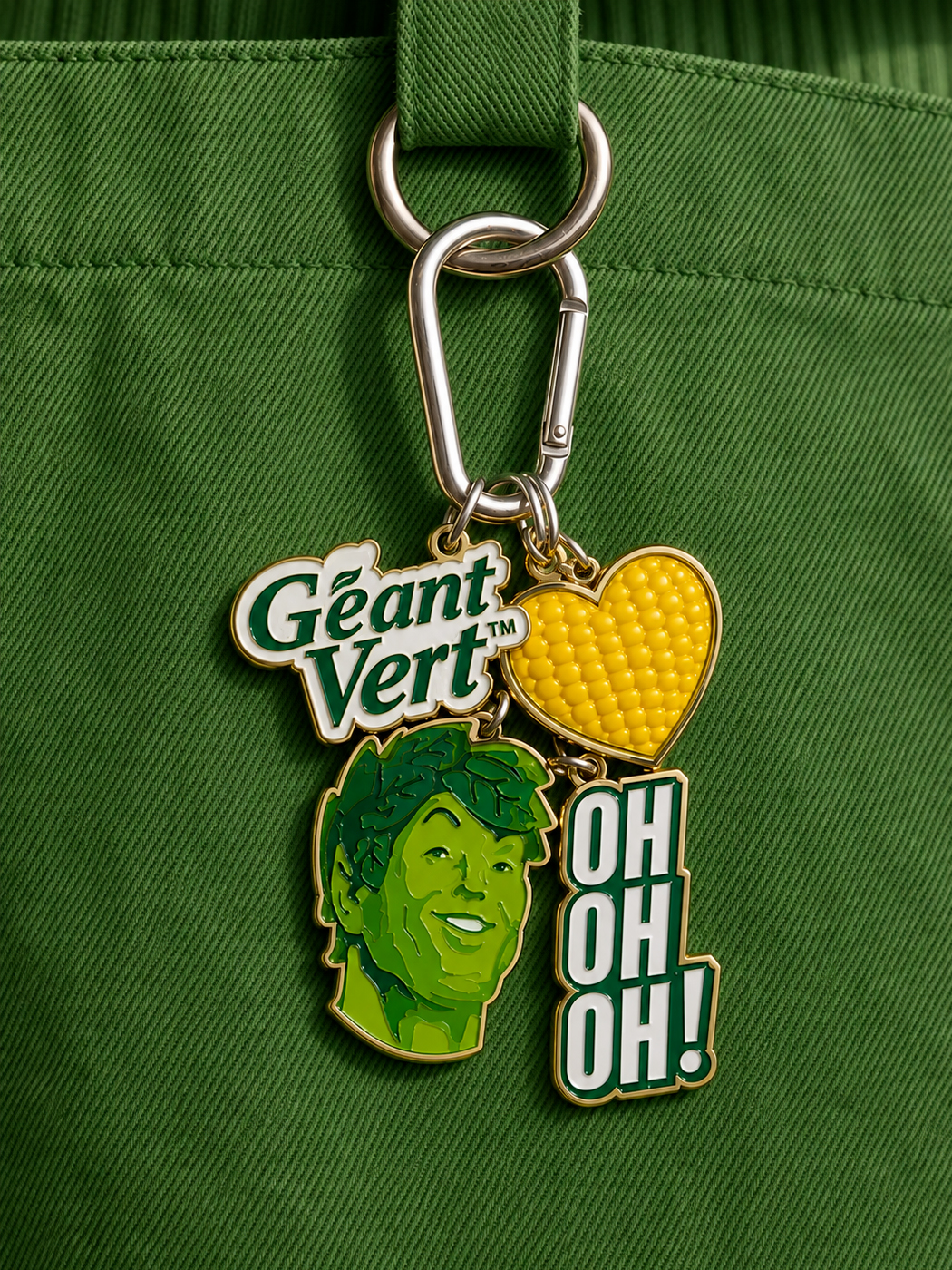 Porte-clés collector : logo Géant Vert, cœur de maïs, visage du géant et « Oh oh oh ! »